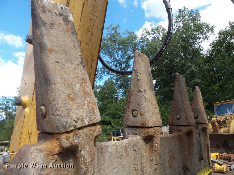 image for item DB7048 1999 New Holland 675E backhoe