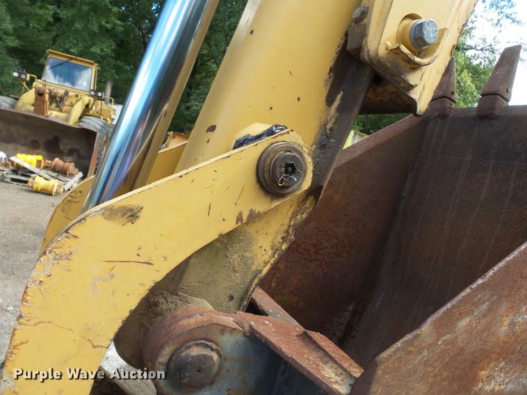 image for item DB7048 1999 New Holland 675E backhoe