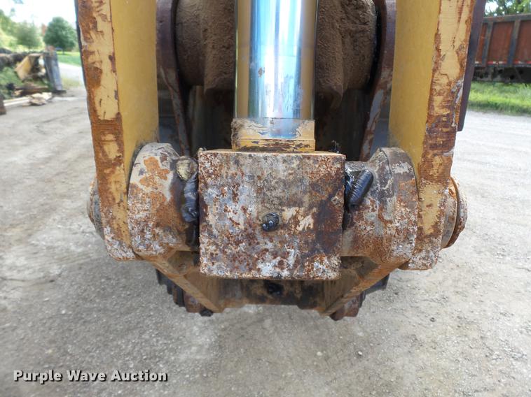 image for item DB7048 1999 New Holland 675E backhoe