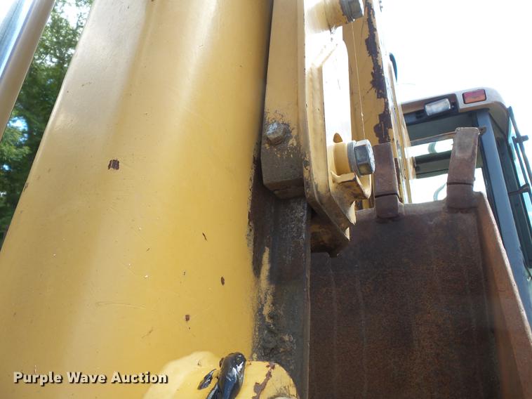 image for item DB7048 1999 New Holland 675E backhoe