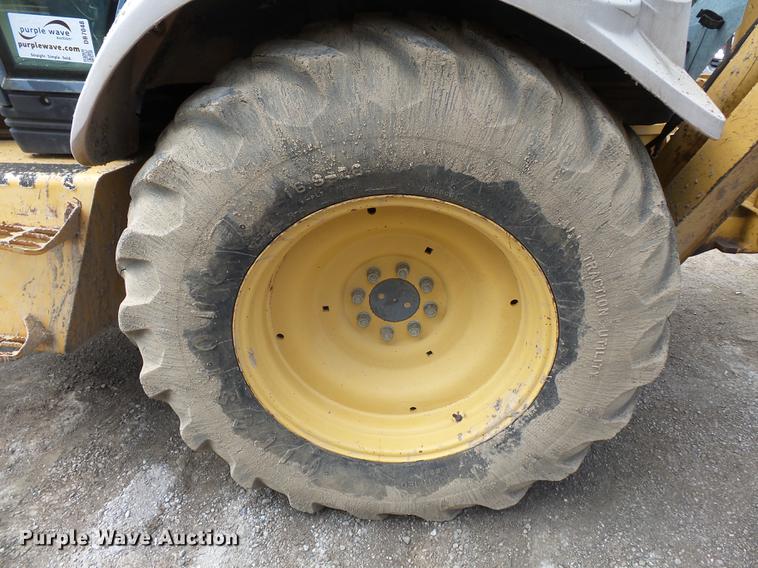 image for item DB7048 1999 New Holland 675E backhoe