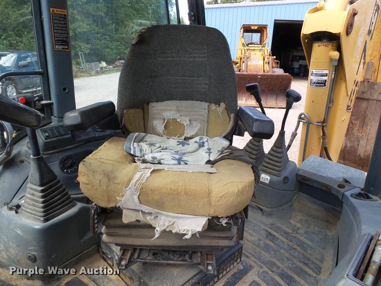 image for item DB7048 1999 New Holland 675E backhoe