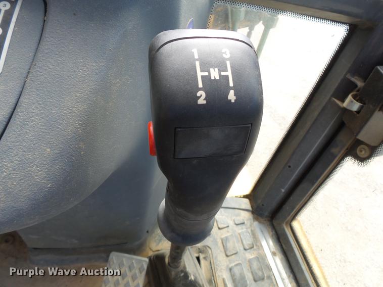 image for item DB7048 1999 New Holland 675E backhoe