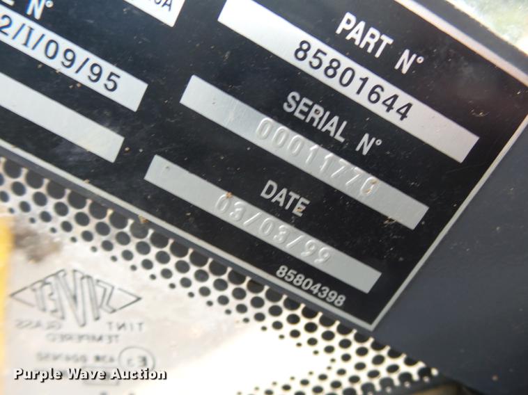 image for item DB7048 1999 New Holland 675E backhoe