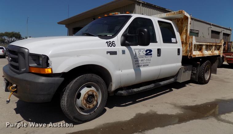 image for item DB8635 1999 Ford F450 Super Duty Crew Cab dump truck