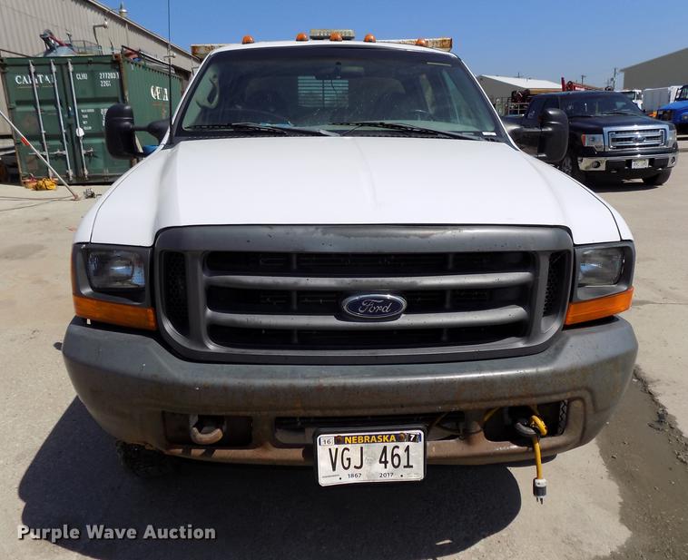 image for item DB8635 1999 Ford F450 Super Duty Crew Cab dump truck