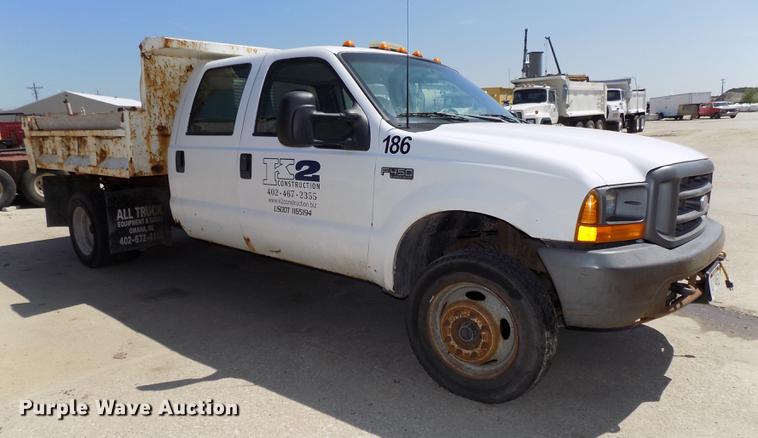 image for item DB8635 1999 Ford F450 Super Duty Crew Cab dump truck