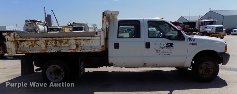 image for item DB8635 1999 Ford F450 Super Duty Crew Cab dump truck