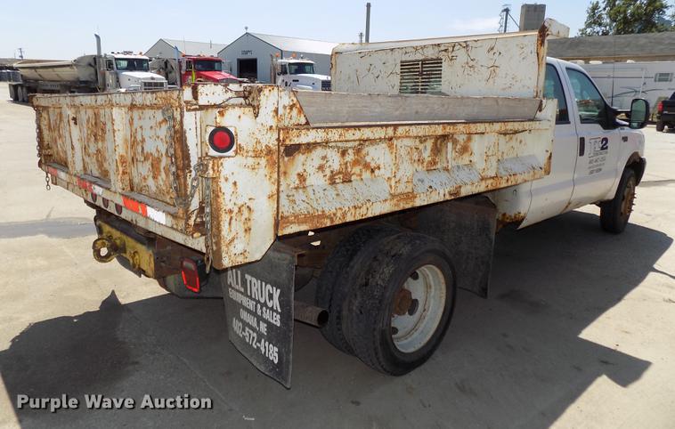 image for item DB8635 1999 Ford F450 Super Duty Crew Cab dump truck