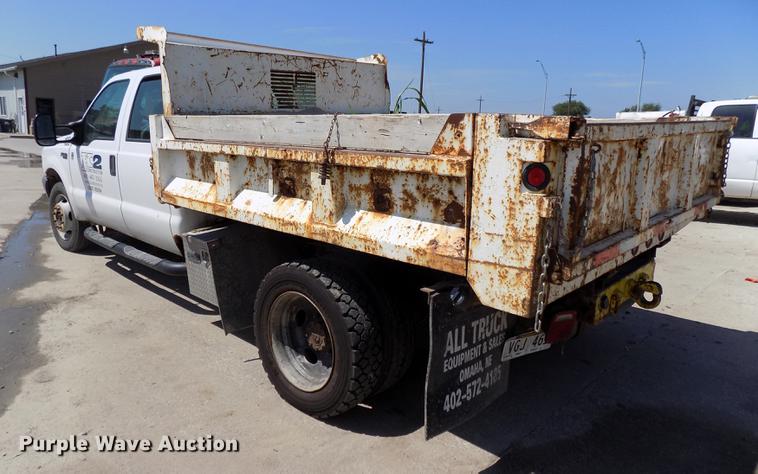 image for item DB8635 1999 Ford F450 Super Duty Crew Cab dump truck