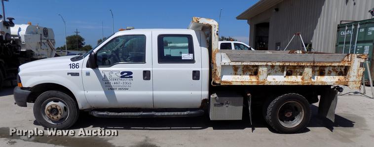 image for item DB8635 1999 Ford F450 Super Duty Crew Cab dump truck