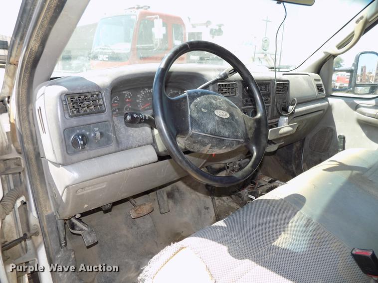 image for item DB8635 1999 Ford F450 Super Duty Crew Cab dump truck