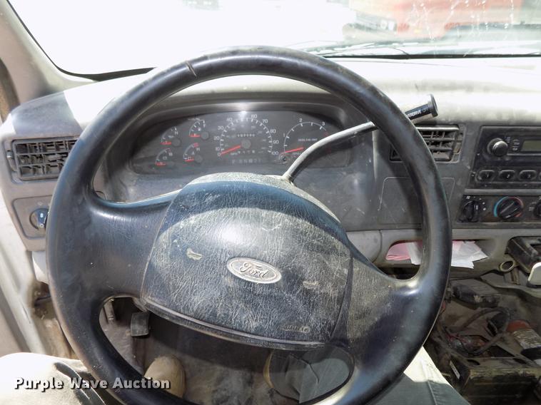 image for item DB8635 1999 Ford F450 Super Duty Crew Cab dump truck