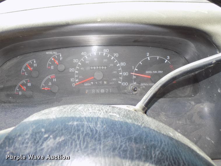 image for item DB8635 1999 Ford F450 Super Duty Crew Cab dump truck