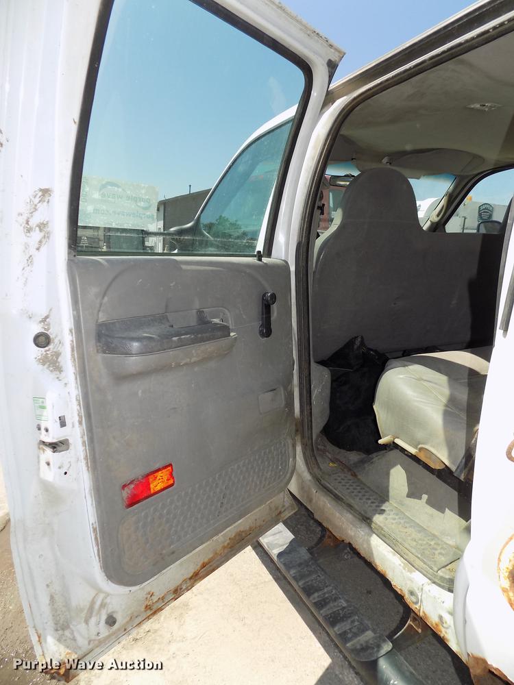 image for item DB8635 1999 Ford F450 Super Duty Crew Cab dump truck