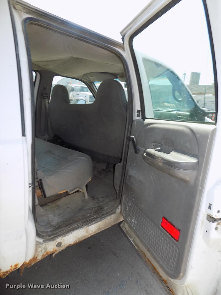 image for item DB8635 1999 Ford F450 Super Duty Crew Cab dump truck