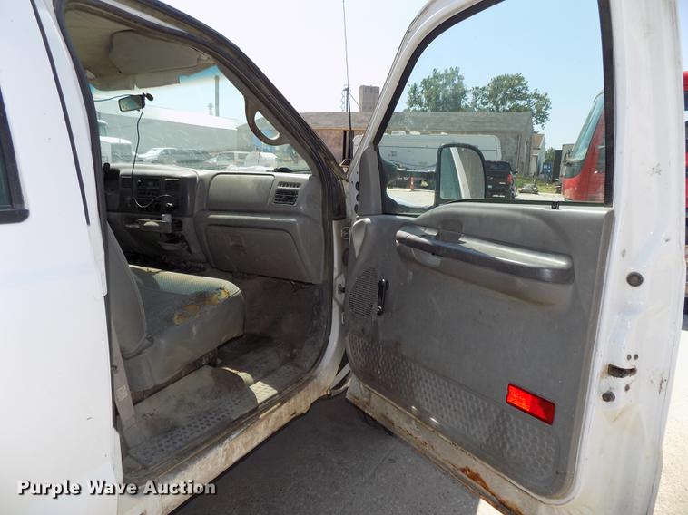 image for item DB8635 1999 Ford F450 Super Duty Crew Cab dump truck