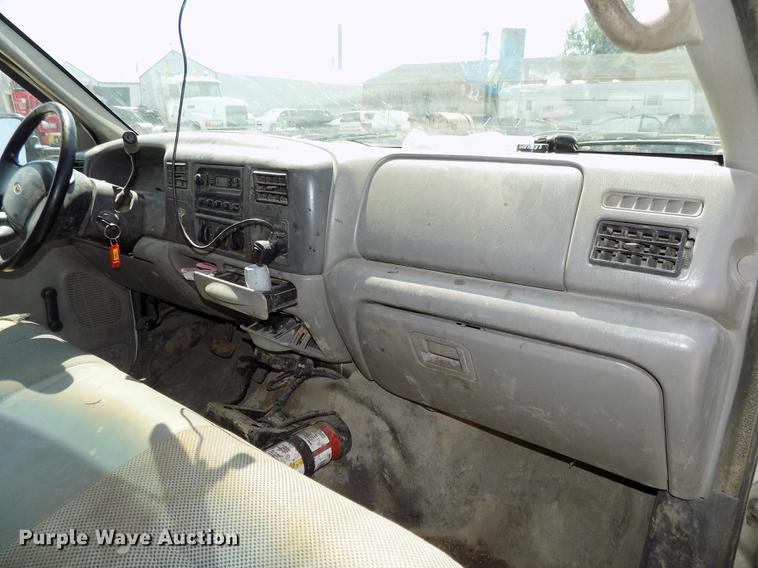 image for item DB8635 1999 Ford F450 Super Duty Crew Cab dump truck