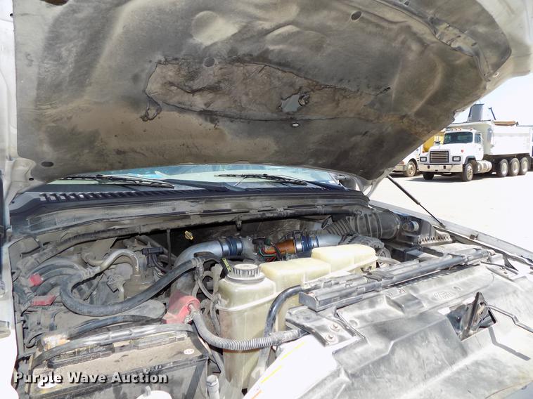 image for item DB8635 1999 Ford F450 Super Duty Crew Cab dump truck