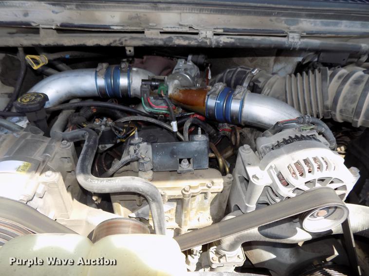 image for item DB8635 1999 Ford F450 Super Duty Crew Cab dump truck