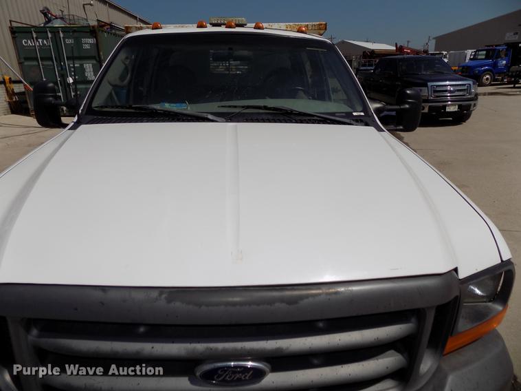 image for item DB8635 1999 Ford F450 Super Duty Crew Cab dump truck