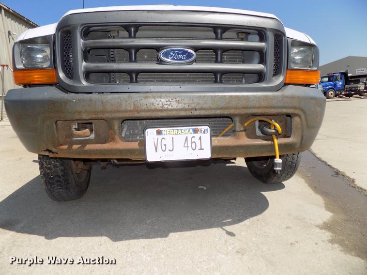 image for item DB8635 1999 Ford F450 Super Duty Crew Cab dump truck