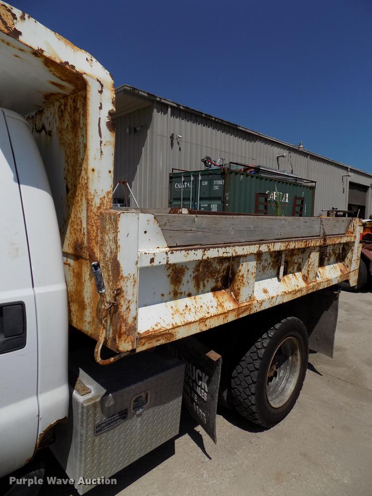 image for item DB8635 1999 Ford F450 Super Duty Crew Cab dump truck