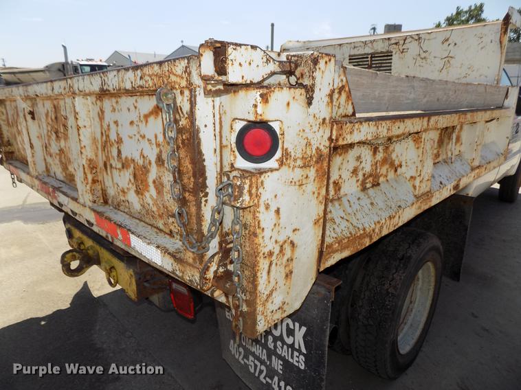 image for item DB8635 1999 Ford F450 Super Duty Crew Cab dump truck