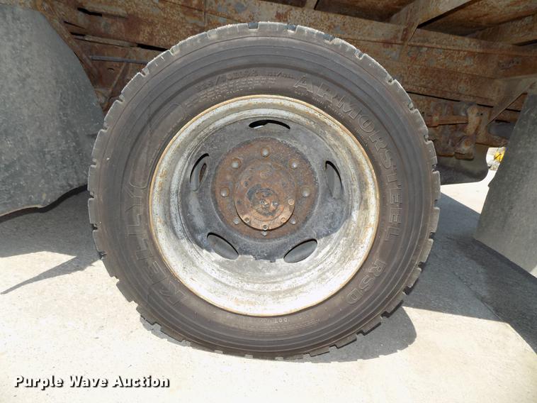 image for item DB8635 1999 Ford F450 Super Duty Crew Cab dump truck