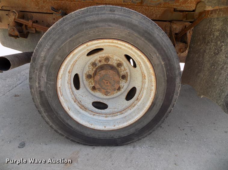 image for item DB8635 1999 Ford F450 Super Duty Crew Cab dump truck