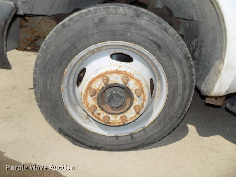 image for item DB8635 1999 Ford F450 Super Duty Crew Cab dump truck