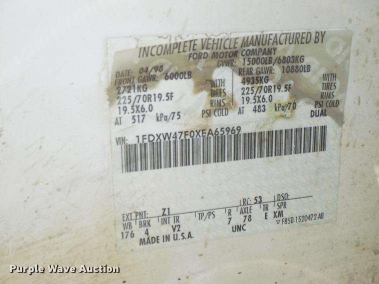 image for item DB8635 1999 Ford F450 Super Duty Crew Cab dump truck