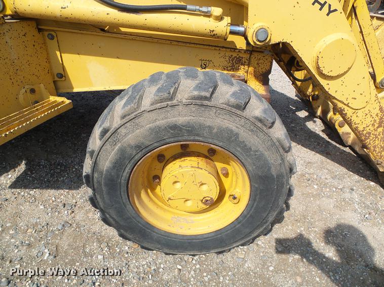 image for item DD5843 1996 John Deere 310D backhoe