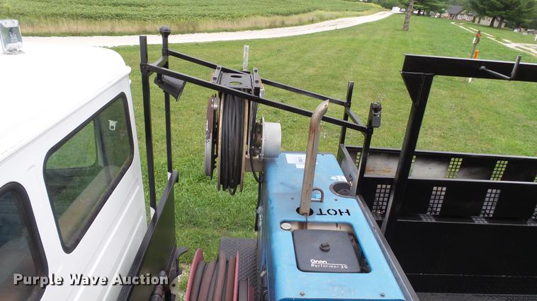 image for item DD7366 2001 Freightliner FL70 service truck