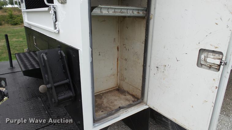 image for item DD7366 2001 Freightliner FL70 service truck