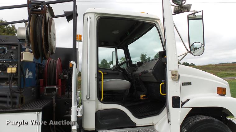 image for item DD7366 2001 Freightliner FL70 service truck