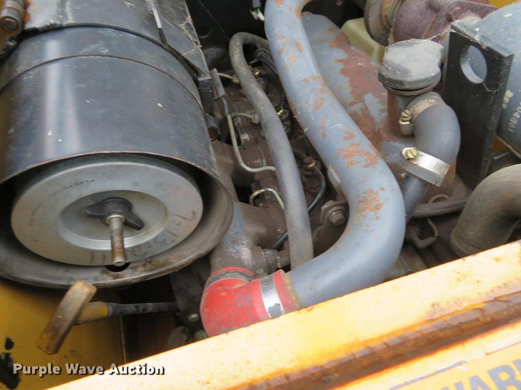 image for item DE6385 1995 New Holland LX885 skid steer