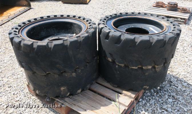 image for item DS9516 (4) 33 x 12-20 solid skid steer tires