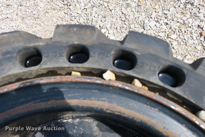 image for item DS9516 (4) 33 x 12-20 solid skid steer tires