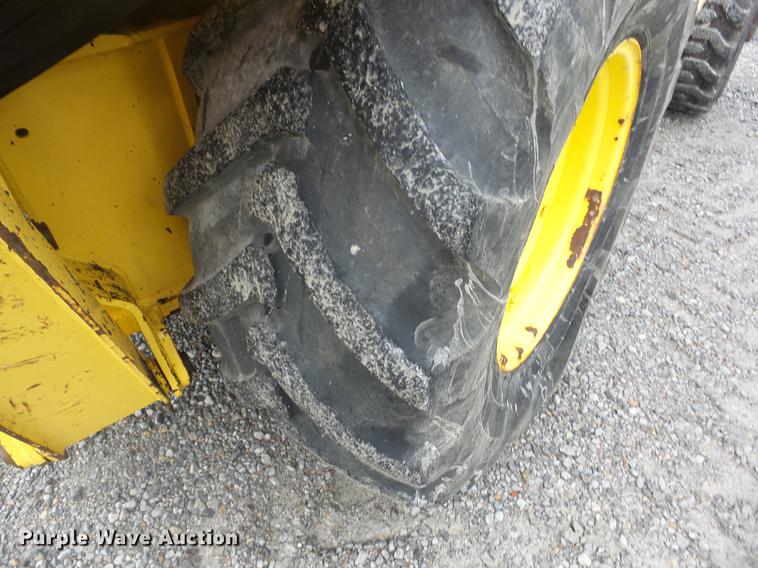 image for item K6259 New Holland LB75 backhoe