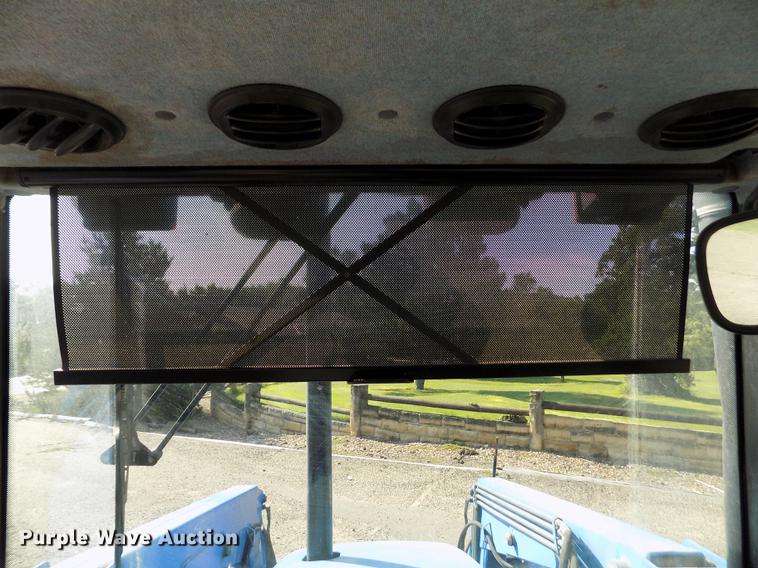 image for item DB9122 2002 New Holland TS100 MFWD tractor