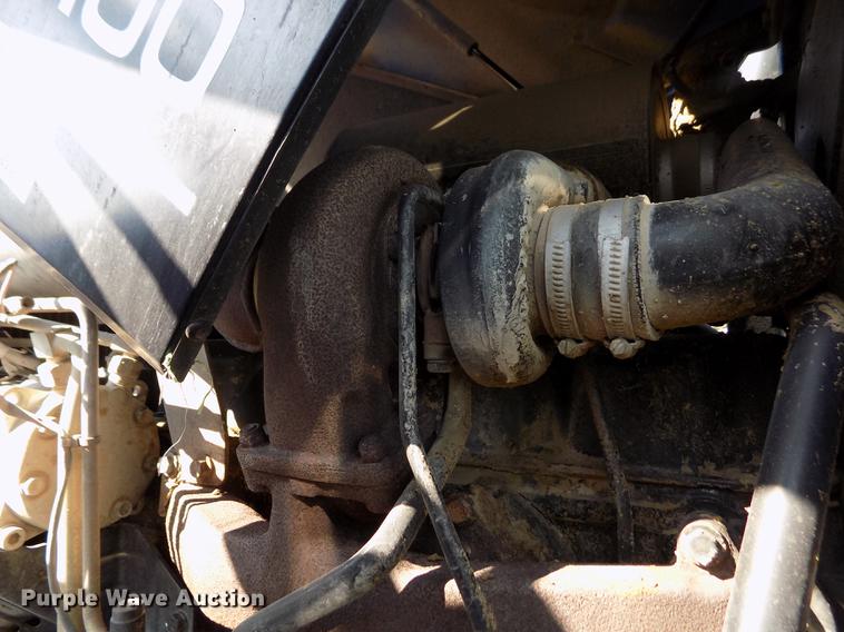 image for item DB9122 2002 New Holland TS100 MFWD tractor