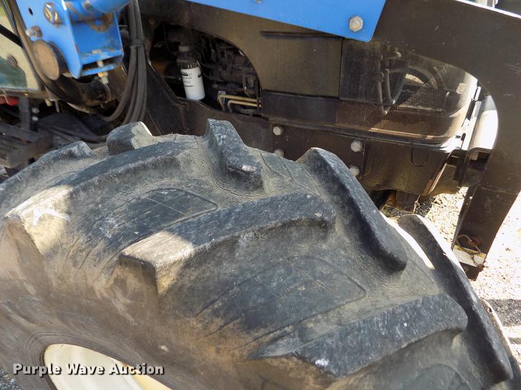 image for item DB9122 2002 New Holland TS100 MFWD tractor