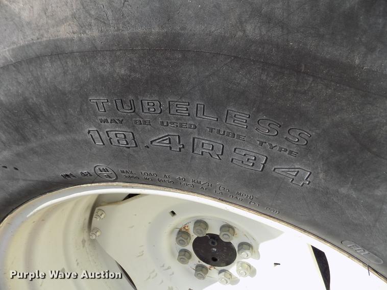 image for item DB9122 2002 New Holland TS100 MFWD tractor