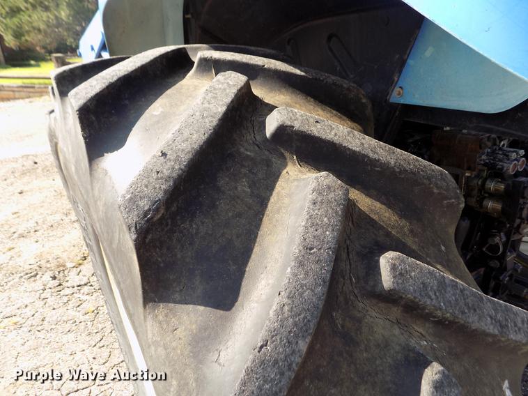 image for item DB9122 2002 New Holland TS100 MFWD tractor