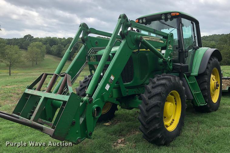 image for item G1307 2005 John Deere 7320 MFWD tractor