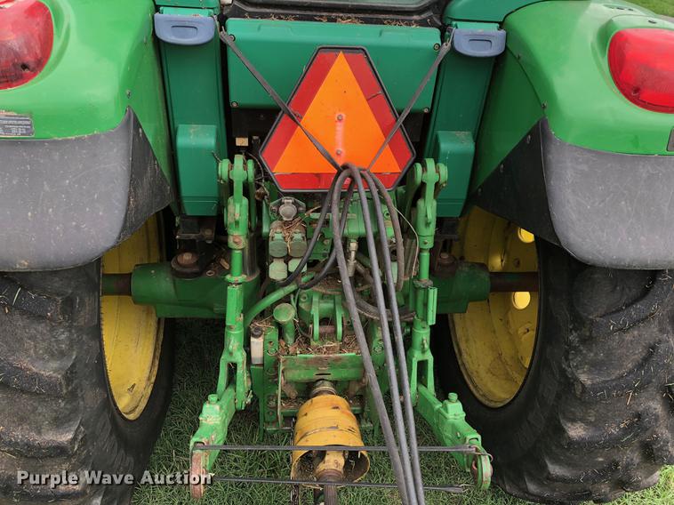 image for item G1307 2005 John Deere 7320 MFWD tractor