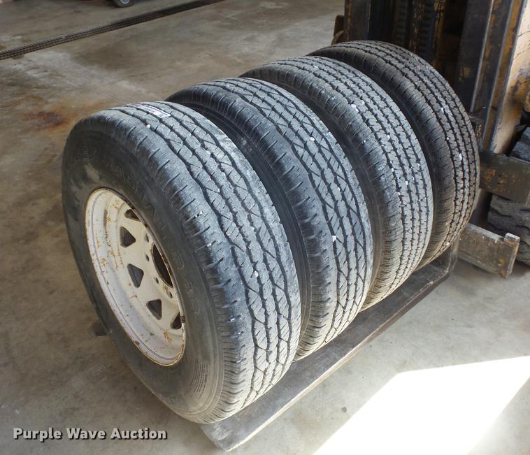 image for item EI9916 (4) 9.50R16.5LT tires and wheels