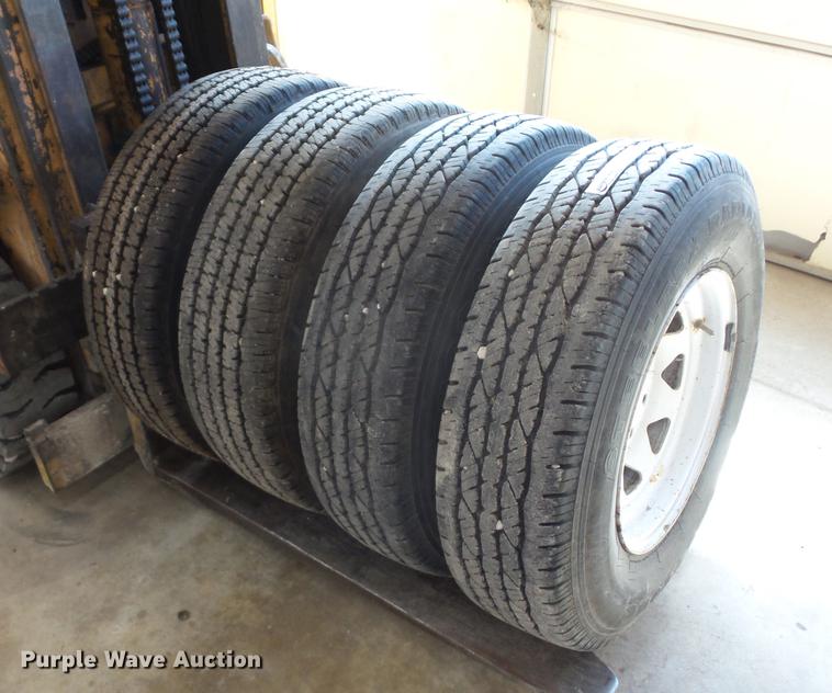 image for item EI9916 (4) 9.50R16.5LT tires and wheels