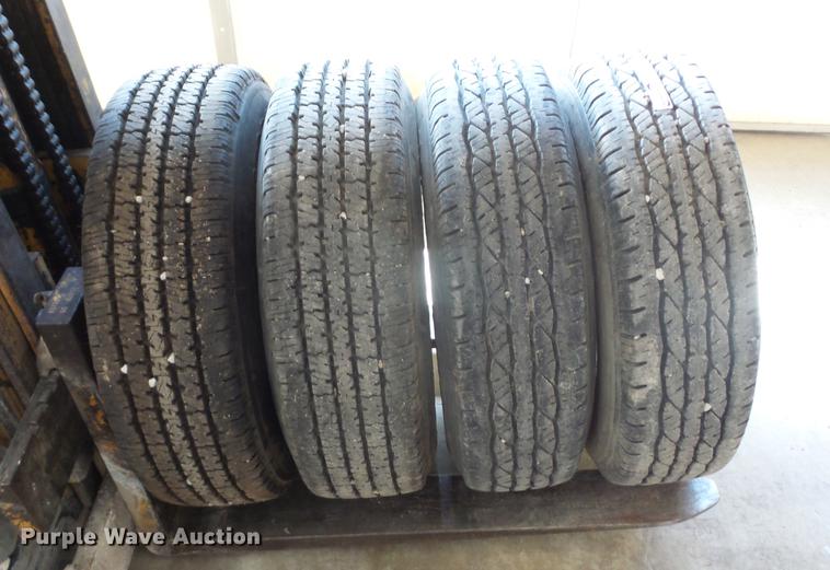 image for item EI9916 (4) 9.50R16.5LT tires and wheels